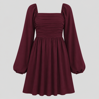 Long sleeve mini dress with square neckline, pleated bodice, defined waist, and flowy fit-and-flare silhouette
