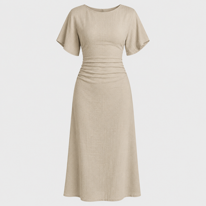 Short sleeve maxi dress with round neckline, ruched waistband, and sleek column silhouette