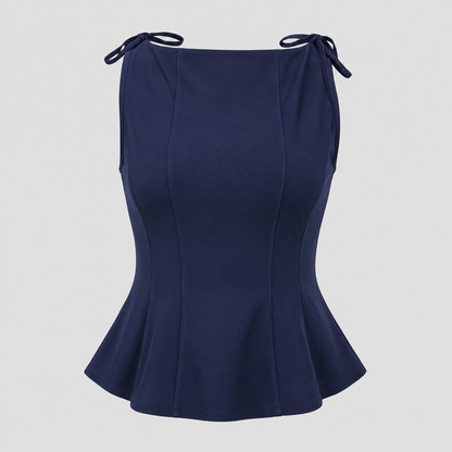 Sleeveless peplum top with boat neckline, shoulder tie accents, sculpted seams, and tailored waist for an elegant structured silhouette