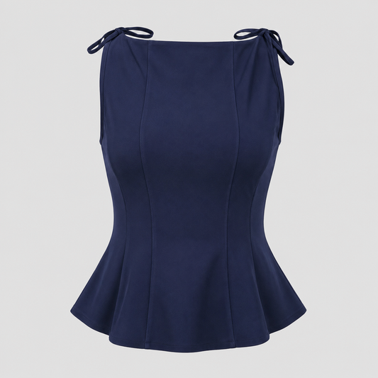 Sleeveless peplum top with boat neckline, shoulder tie accents, sculpted seams, and tailored waist for an elegant structured silhouette