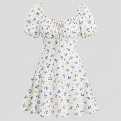 Floral mini dress with square neckline, front tie detail, short puff sleeves, and fit-and-flare silhouette