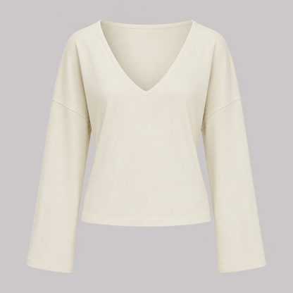 V-neck fitted top with gathered waist, long drape sleeves, and a sleek modern silhouette