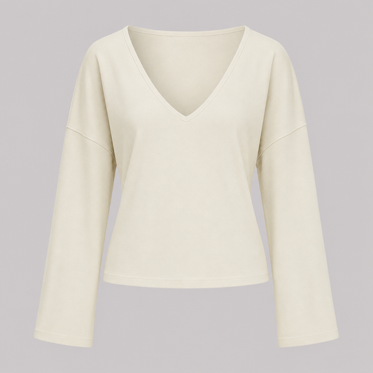 V-neck fitted top with gathered waist, long drape sleeves, and a sleek modern silhouette