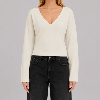 V-neck fitted top with gathered waist, long drape sleeves, and a sleek modern silhouette