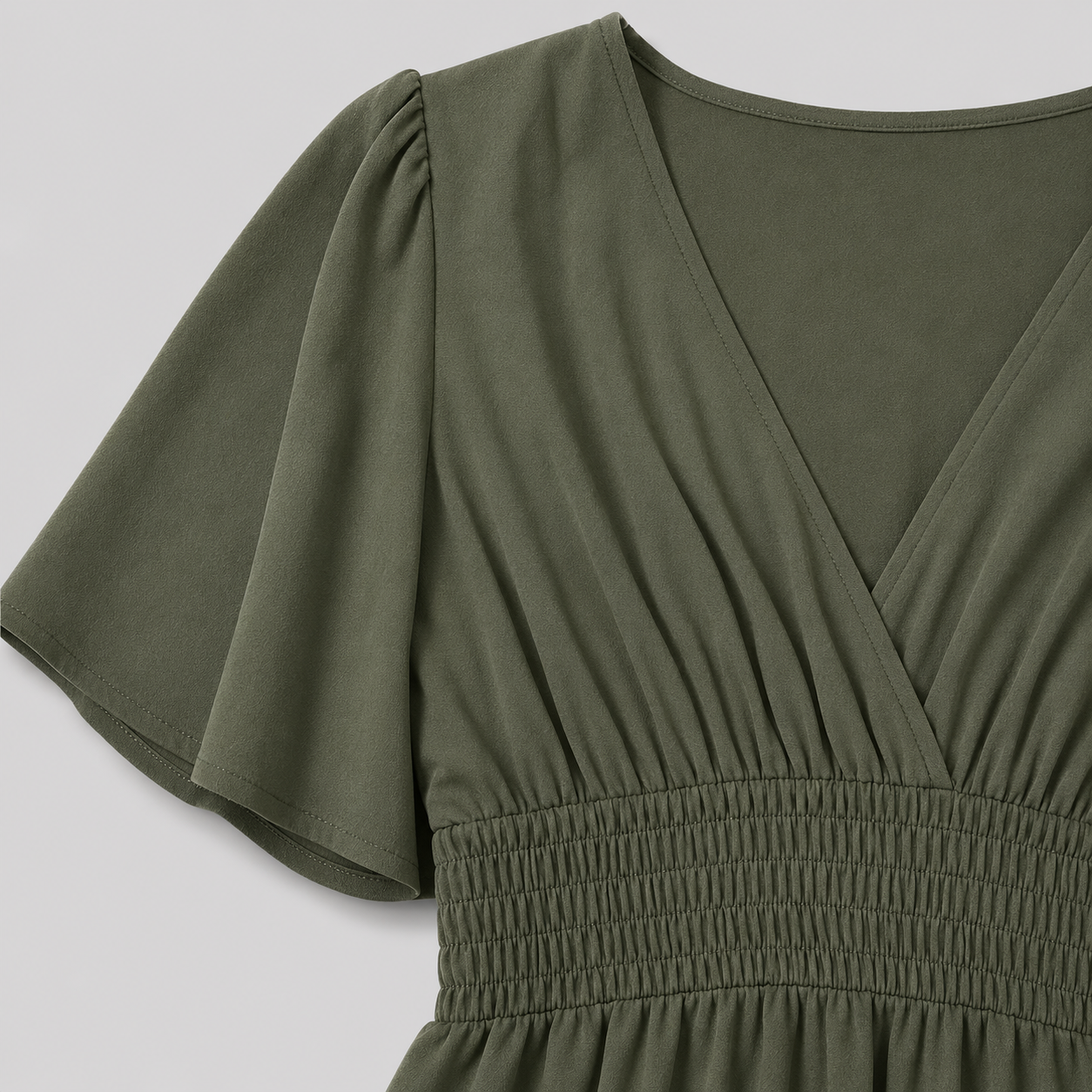 Flutter sleeve maxi dress with surplice V-neckline, smocked waistband, and flowing floor-length silhouette